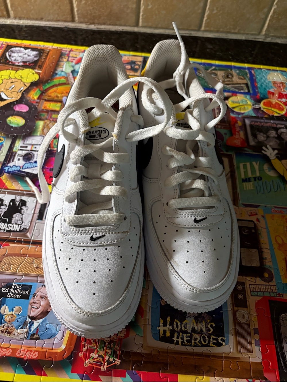 Nike Kids White Sneakers with Black Swoosh
